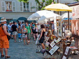 Get your portrait done Place du Tertre as Paris souvenir