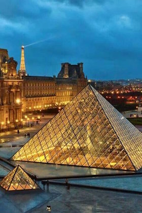 Louvre Museum at night is beautiful